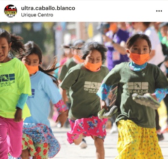 Kids running in the Caballo Blanco Ultra Marathon.